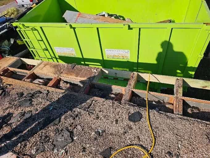 Tear-off day — old roof out, site kept clean
