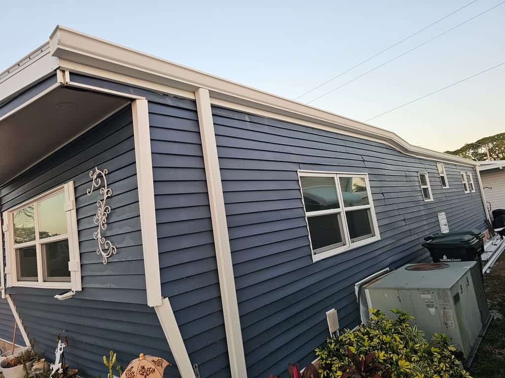 Install 6 inch seamless gutter and 3" by 4" downspouts
